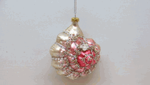 December Diamonds pink and gold spiral seashell holiday ornament shell