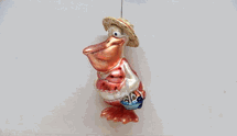 December Diamonds glass Pelican in swimsuit holiday ornament