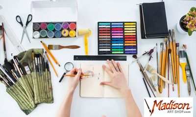 Monday Plan with art supplies on desk