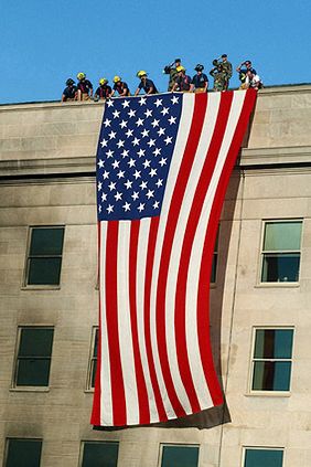 9/11 Firefighter Flag on Pentagon Photo Print for Sale