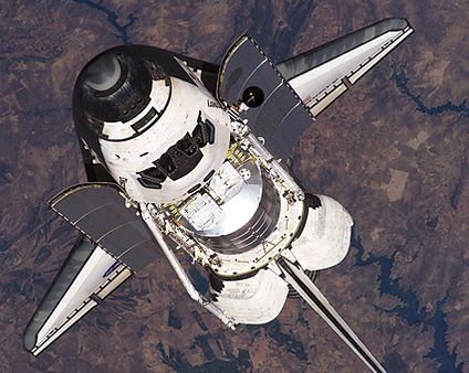 NASA Space Shuttle Discovery in Orbit Photo Print