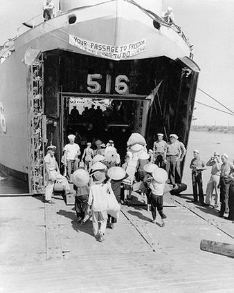 Vietnamese Refugees Board U.S. Navy Ship LST 516 Photo Print