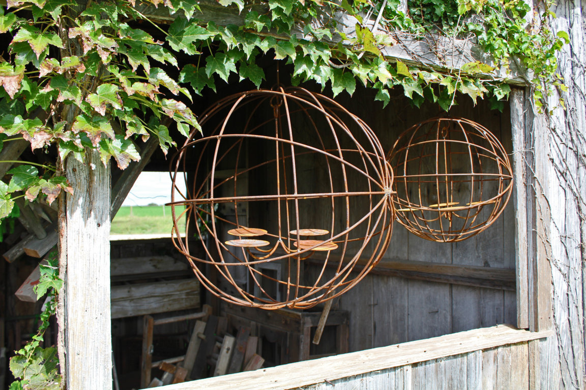 24" Wrought Iron Eclipse Chandelier Outdoor Wax Candles