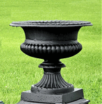 Before & After: Classic Cast Iron Urns Transform This Front Entrance