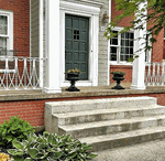 Before & After: Classic Cast Iron Urns Transform This Front Entrance