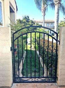 Clients Handmade Donovan Gate Fitting Neatly In 4' x 4' Entry