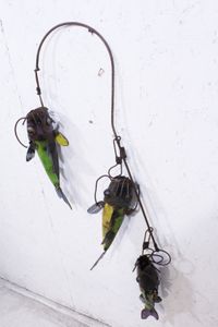 Recycled metal Fish on a String
