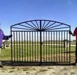Metal Center Divide Sunburst Driveway Entry Gate.