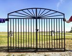 Metal Center Divide Sunburst Driveway Entry Gate.