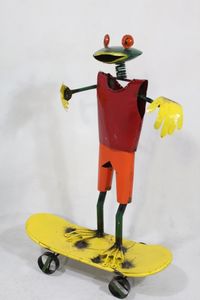 Recycled Metal Frog On Skateboard Yard Decor