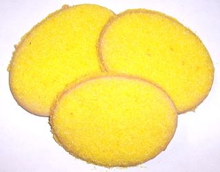 1/2 Pound Egg Shaped Sugar Cookies with Yellow Sugar in a Decorative Bag