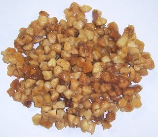 1/2 Pound Glazed Macadamia Nuts in a Decorative Bag