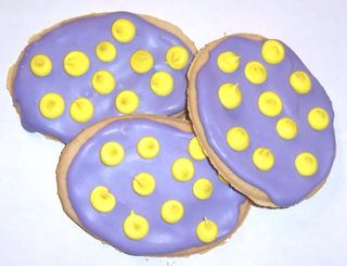 1/2 Pound Lavender Iced Egg Shaped Sugar Cookies with Yellow Polka-Dots in a Standing Box