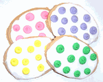 1/2 Pound White Iced Egg Shaped Sugar Cookies with Mixed Polka-Dots in a Decorative Bag