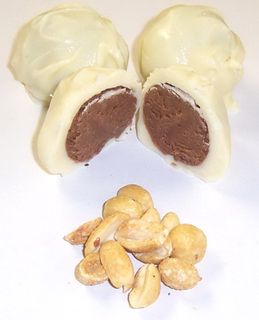 Chocolate Peanut Fudge Truffles covered in White Chocolate in a 1/2 Pound Decorative Box