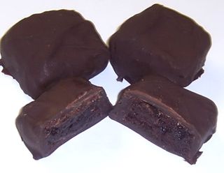 Dark Chocolate Covered Browine Bites in a Large Tin