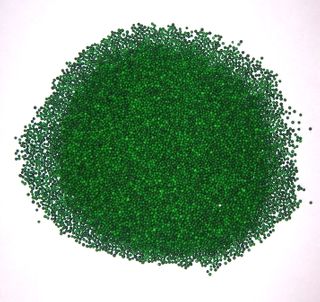 Green Non-Pareils in a 1 Pound Container