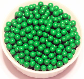 Green Sixlets in a 1/2 Pound Container