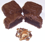 Milk Chocolate Covered Browine Bites with Pecans in a Large Tin