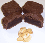 Milk Chocolate Covered Brownie Bites with Cashews in a Small Tin