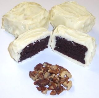 White Chocolate Covered Brownie Bites with Pecans in a Mini Tin