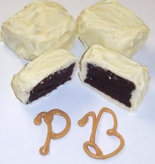 White Chocolate Covered Peanut Butter Brownie Bites in a 8 oz. Standing Box