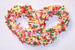 White Chocolate Covered Pretzels with Rainbow Jimmies in a 1/2 Pound Standing Box