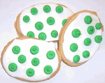 White Iced Egg Shape Cookie with Green Polka Dots