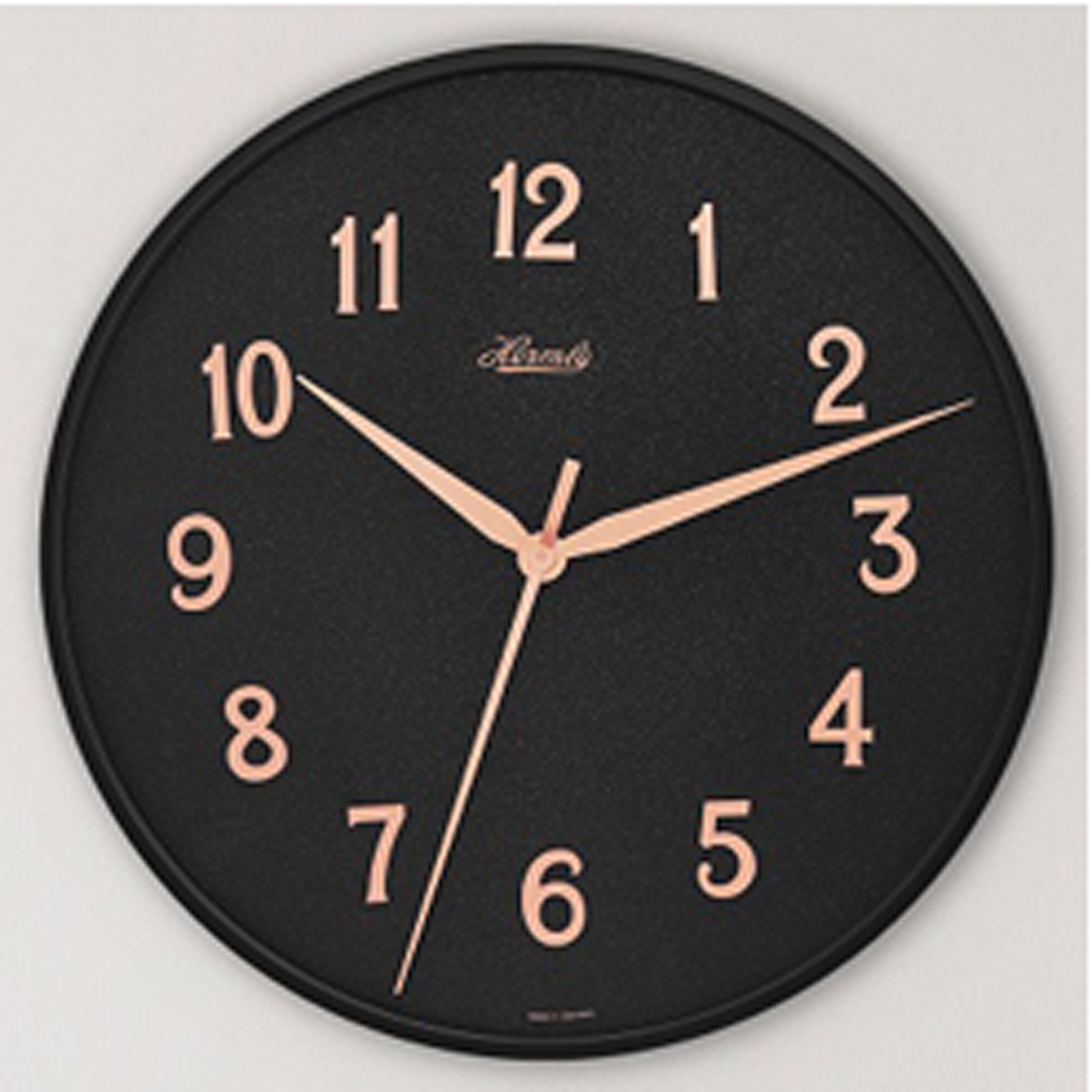 Aria Black on Black Wall Clock with Rose Gold Arabic Numerals by Hermle