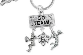 <Br>                EXCLUSIVELY OURS!! <Br>           AN ALLAN ROBIN DESIGN!! <Br>              LEAD & NICKEL FREE!! <BR> W20205KC - SILVER TONE "GO TEAM!" <BR>   VOLLEYBALL THEMED KEY RING WITH <BR>  BUMP, "TEAM MOM" & SERVE CHARMS <BR>        FROM $6.41 TO $14.25 2013