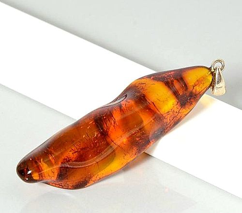 Baltic Amber Amulets Made of Natural Shape Amber Rock.