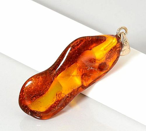 Baltic Amber Amulets Made of Natural Shape Cognac Color Amber Rock.