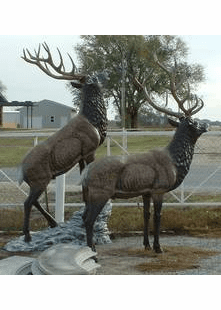 LIFE SIZE ELK ON ROCKS METAL SCULTURE