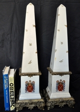 Decorated porcelain parcel-gilt mounted obelisks