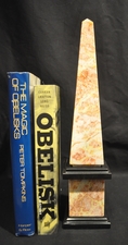 Pink marble obelisk with solid black marble trim