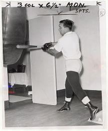 Gene Fullmer Hits Heavybag with Baseball Bat - 1962 Vintage Boxing Photograph