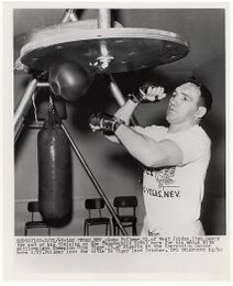 Gene Fullmer Hitting Speedbag - 1963 Vintage Boxing Photograph