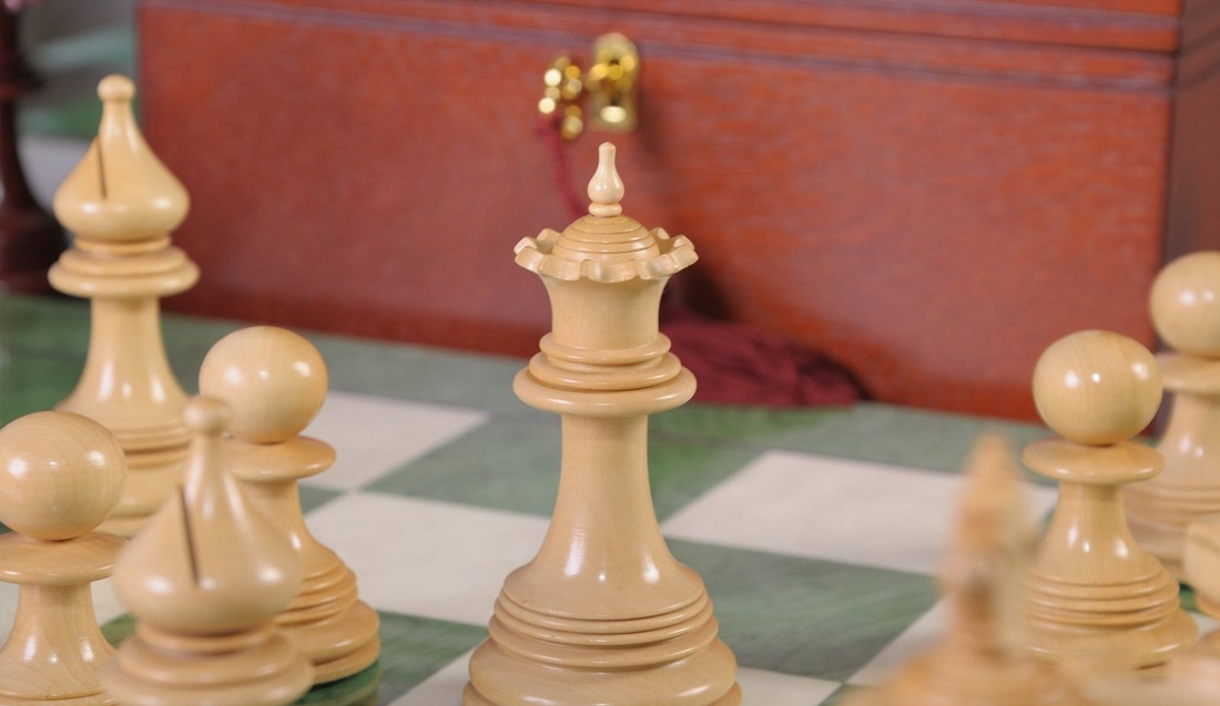 Premium Photo  The gold queen chess piece standing with falling