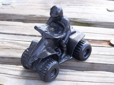 ATV Rider Handcrafted from Coal by Kentucky Artisans