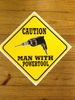 Caution Man With Powertool Sign
