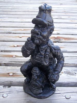Handcrafted in Kentucky Coal Figurine Train Engineer Sitting on a Steam Engine Train Smoking a Pipe