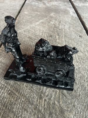Miner and Cart Handcrafted From Coal by Kentucky Artisans