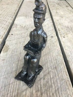 Miner Reading the Bible