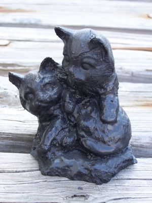 Two Cats Handcrafted from Coal