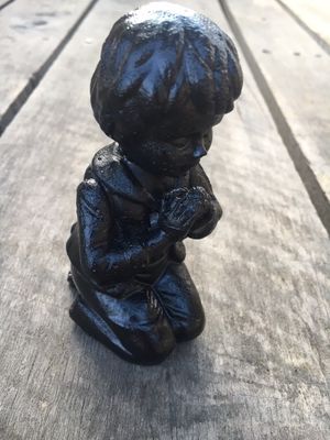 Praying Boy Made from Coal
