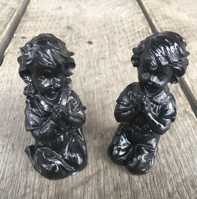 Praying Boy and Girl Made Coal