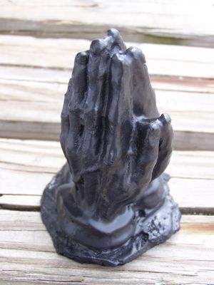 Praying Hands made from coal