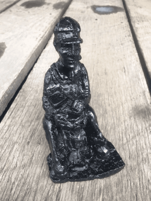 Sitting Coal Miner