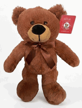 #C9- 12" BROWN TEDDY BEAR WITH RIBBON