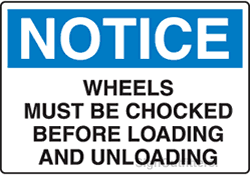 Notice - Wheels Must Be Chocked Before Loading and Unloading
